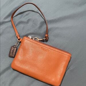 Coach Small Pebbled Leather Wristlet in Cognac